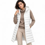 Gilet Matelassé Mi-Long pour Femme - Doudoune Sans Manches Légère avec Capuche Fixe et Rembourrage Doux